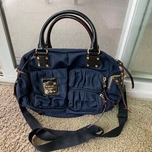 MZ Wallace dark blue bag, very stylish! It’s been very gently used.